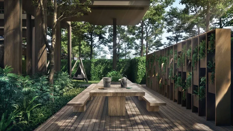 ELTA, artist&rsquo;s impression: the gardening corner, a long timber table on a deck beside a planted green wall under the trees